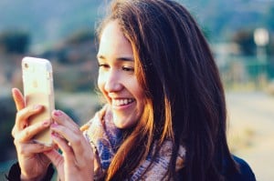 Girl with phone in hand